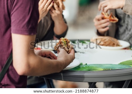 Similar – Mann hält Hot Dog im Barbecue mit Freunden.