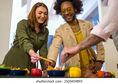 People Eating Vegan Buffet, Multiracial Group Of Friends Having Fun At Party, Raw Vegetables Snack And Healthy Food, Bio Organic And Sustainability Food Chain