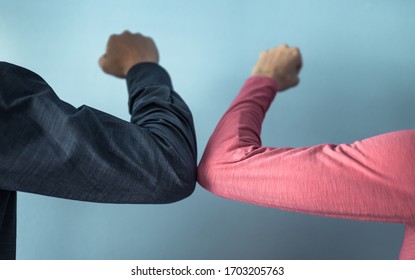 People Elbow Bump Greeting Each Other.  Alternative For Hand Shake To Help Stop The Spread Of Germs, Coronavirus Concept. 