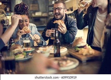 People Enjoy Food Drinks Party Restaurant