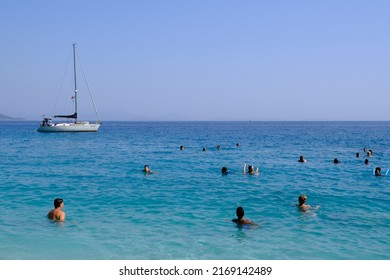 People Enjoy The Sea In Gidaki Beach, Greece On July 31, 2021.