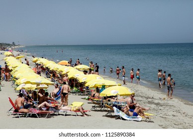 People Enjoy Sun On Beach On Stock Photo 1125890384 | Shutterstock