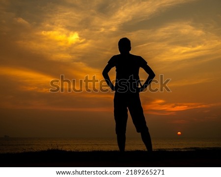 People enjoy the sunset. Beautiful sunset. Silhouette photography with people at the beach. the beauty of the sunset sky. Freedom people