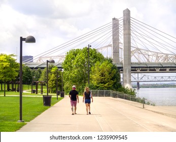 People Enjoy The Walking Path Along Waterfront Park In Louisville Kentucky