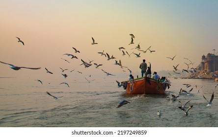 People enjoying boat ride in Ganges in Varanasi, India - Shutterstock ID 2197249859