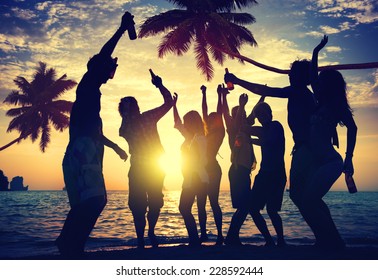 People Enjoying Party By The Beach