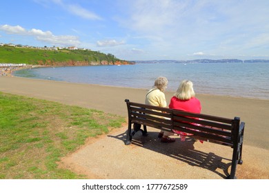 People Enjoying Summer Vacation On The South Devon Coast