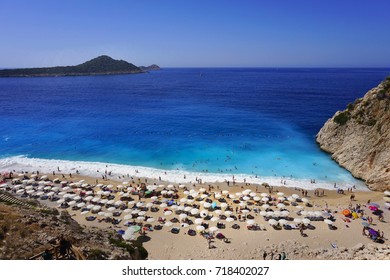   People Enjoying Sun And Sea At The  Turquise Sea And Sandy Beach Of Kaputas, Kas, Antalya, Turkey. 27.08.2017                            