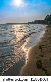 People enjoying the sunset and beach on Lake Erie, Port Dover, ON-CA