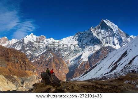People enjoying view of Machhapuchchhre mountain - Fish Tail in English is a mountain in the Annapurna Himalya, Nepal