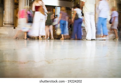 People Entering Into Modern Shop. Blurred Motion.