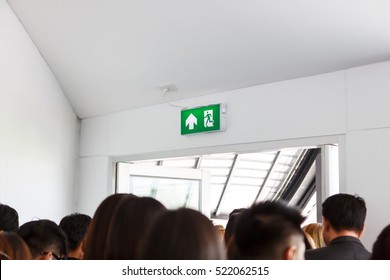 People Escape To Fire Exit Door