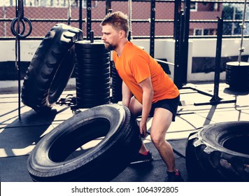 People exercising at fitness gym - Powered by Shutterstock