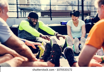 People exercising at fitness gym - Powered by Shutterstock