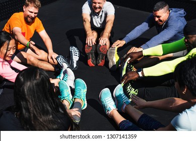 People exercising at fitness gym - Powered by Shutterstock