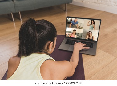 People Exercising At Home Connected To Online Fitness Class On Laptop. Woman Personal Trainer Coach On Zoom Teaching Workout Exercises In Online Body Care, Health And Wellness Business.