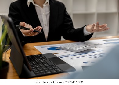 People explaining information from documents, business people meeting together on finance topics, they are working together to plan and solve corporate finance issues. Business administration concept. - Shutterstock ID 2081441080