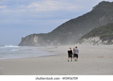 People Exploring A Great Southern Ocean Beach In Walpole,Western Australia/Stormy Beach Day/WALPOLE,WA,AUSTRALIA-SEPTEMBER 30,2014: Tourists At Great Southern Ocean Beach In Walpole,Western Australia