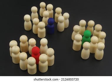 People figures divided into teams with leaders. Team collaboration and separation concept.	 - Shutterstock ID 2126003720