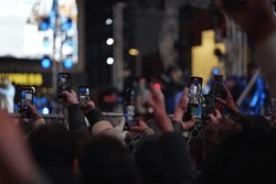 People Filming Concert With Your Smartphones In Times Square, New York