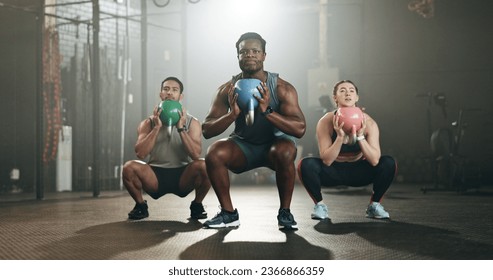 People, fitness and squat at gym with kettlebell in workout class, exercise or training together. Personal trainer with active group in sports, lose weight or muscle endurance at indoor health club - Powered by Shutterstock