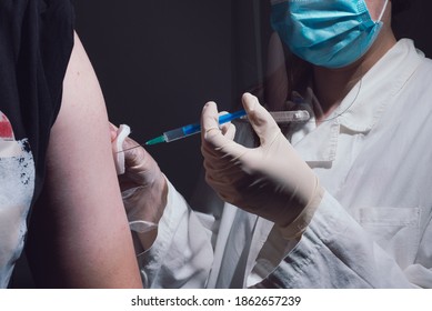 People getting covid-19 vaccine close up