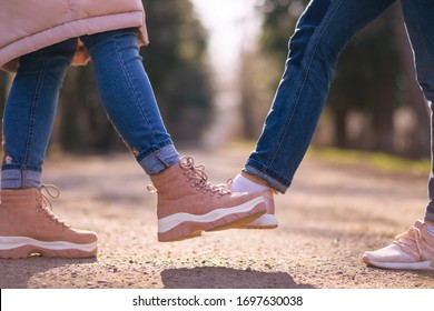 People Greeting With Foots. Alternative Handshake During Coronavirus Epidemic. Covid 19. Coronavirus Prevention. Non-contact Greeting. Foot Shake Style Of Greetings. Coronavirus Epidemic.