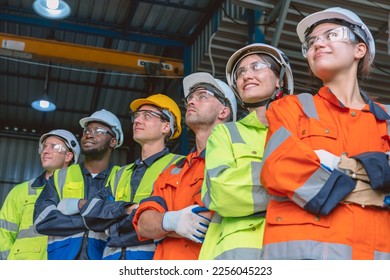 people group of engineer technician and service team worker in safety suit standing together happy smile - Powered by Shutterstock