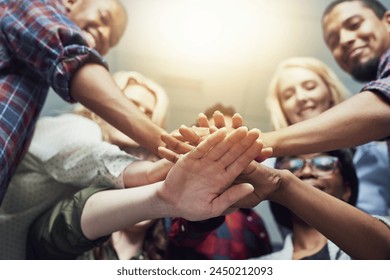 People, group and hands stack as teamwork or community trust, collaboration or diversity. Friends, pile and students or project planning together for global equality or allyship, partnership or union