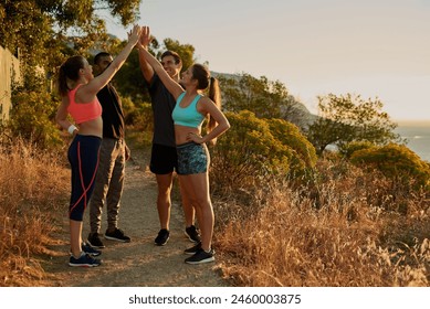 People, group and high five or mountain exercise as trail running support, fitness or victory. Men, women and hand gesture for training goals or sport target or friends celebration, morning or nature - Powered by Shutterstock