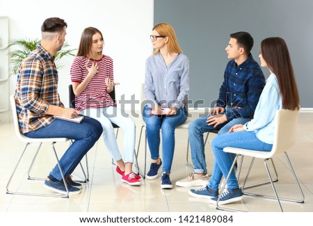 People at group therapy session