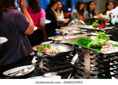 People hand grab delicious asian food in hotel seminar room food and drink - Powered by Shutterstock