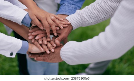 People, hands stack and circle in park for support, teamwork or solidarity with goals in nature. Group, huddle and outdoor for family trust, link and connection with synergy with motivation on lawn