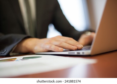 people hands typing on laptop keyboard - Shutterstock ID 241881574