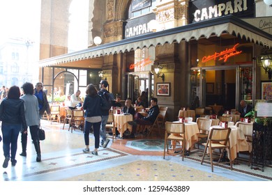 People Having A Coffee Inside Galleria Vittorio Emanuele, Campari Café  03.30.2018 - Milan, Italy.