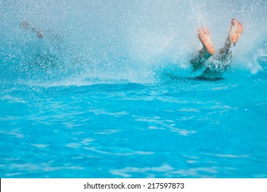 People Having Fun, Sliding At Water Park.