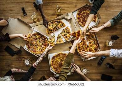 People having a pizza party