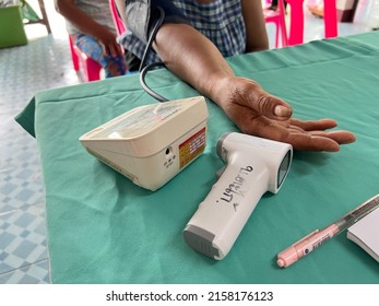 People Health Check Blood Pressure And Hearth Rate With Digital Pressure Gauge Standard Blood Pressure Test Results. Health And Medical Concept , 19 May 2022 , Buriram Province.