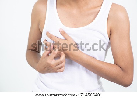 people, healthcare, heart disease and problem concept - unhappy woman suffering from heartache over White background