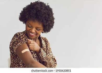 People Healthcare And Protection, Coronavirus Vaccination, Happy Smiling Satisfied African American Woman Getting Covid19 Vaccine Headshot Portrait Studio Grey Background With Copy Space