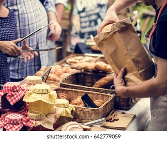 People at healthy local food festive - Shutterstock ID 642779059