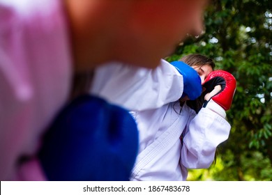 People High Kicks During Training Of Taekwondo Outdoors Bamboo Background