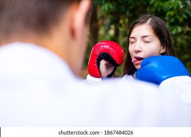 People High Kicks During Training Of Taekwondo Outdoors Bamboo Background