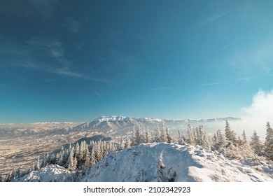 People Hiking In Beautiful Winter Mountains For Winter Sport Activity Snow Mountain Hills. Visit Piatra Craiului National Park To See Its Iconic Rocky Monolith Winter Hiking