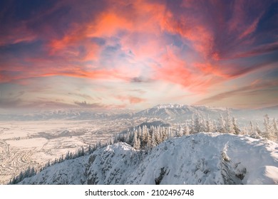 People Hiking In Beautiful Winter Mountains For Winter Sport Activity Snow Mountain Hills. Visit Piatra Craiului National Park To See Its Iconic Rocky Monolith Winter Hiking