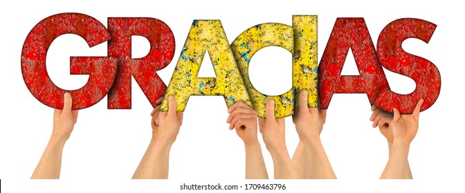 People Holding Up Colorful Red Yellow Spain Flag Wooden Letter With Spanish Word Gracias ( English Translation: Thank You ) Isolated On White Background.  Thankful Grateful Respect Rewarding Concept