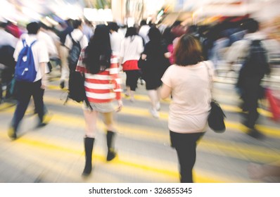 People In Hong Kong Walking Cross Road Concept