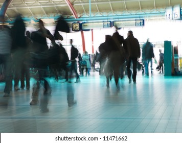 People hurrying to catch a train (or plane) - Powered by Shutterstock