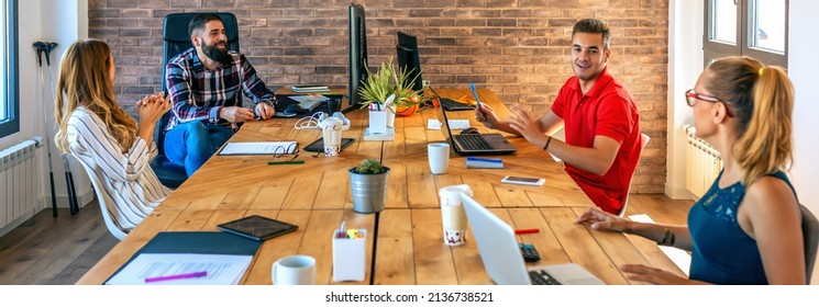 People In An Informal Business Meeting In The Office