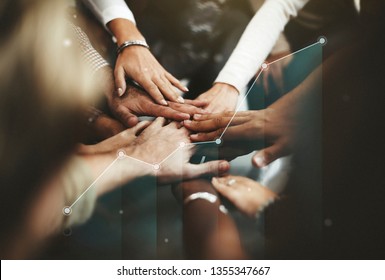 People joining hands in the middle - Shutterstock ID 1355347667